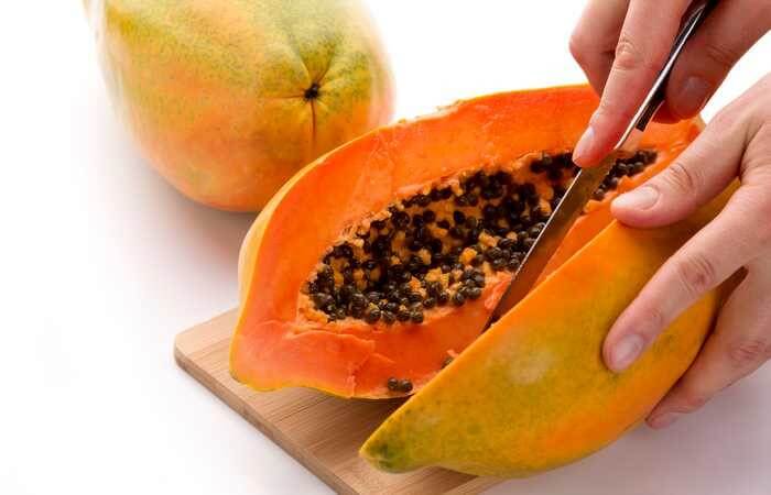 Cutting a papaya