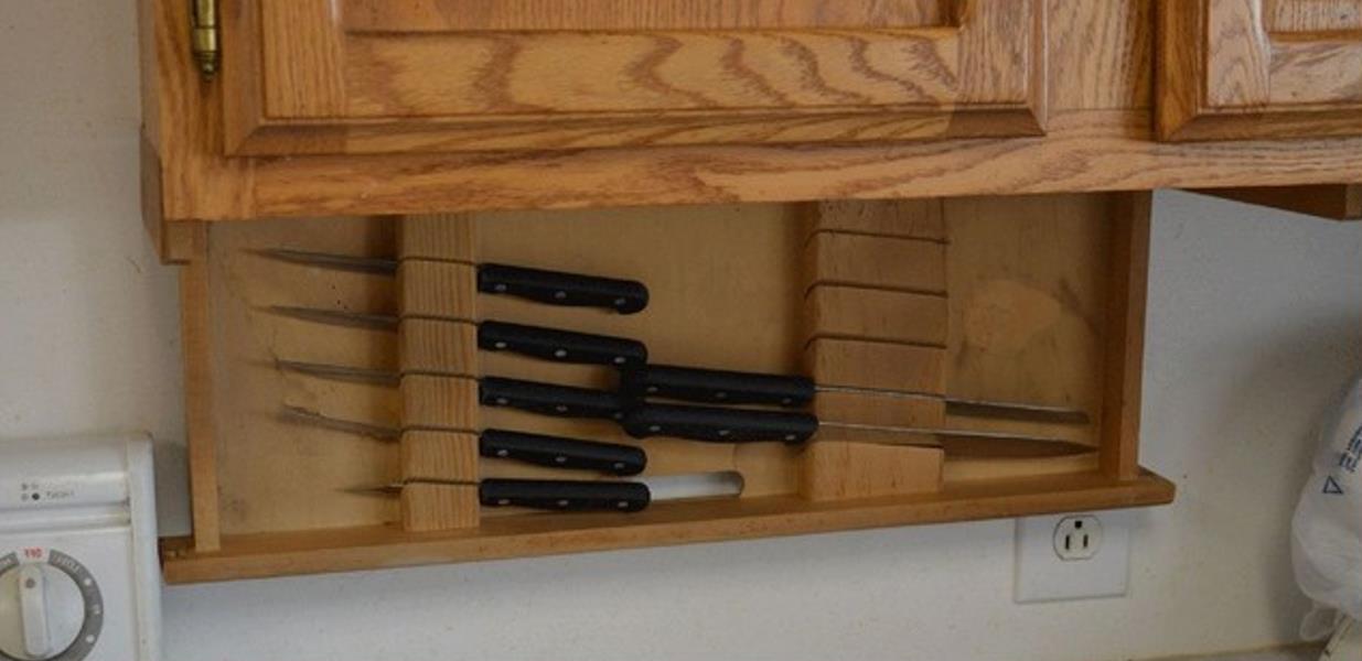 I install a 'The Drop Block' under cabinet knife storage 