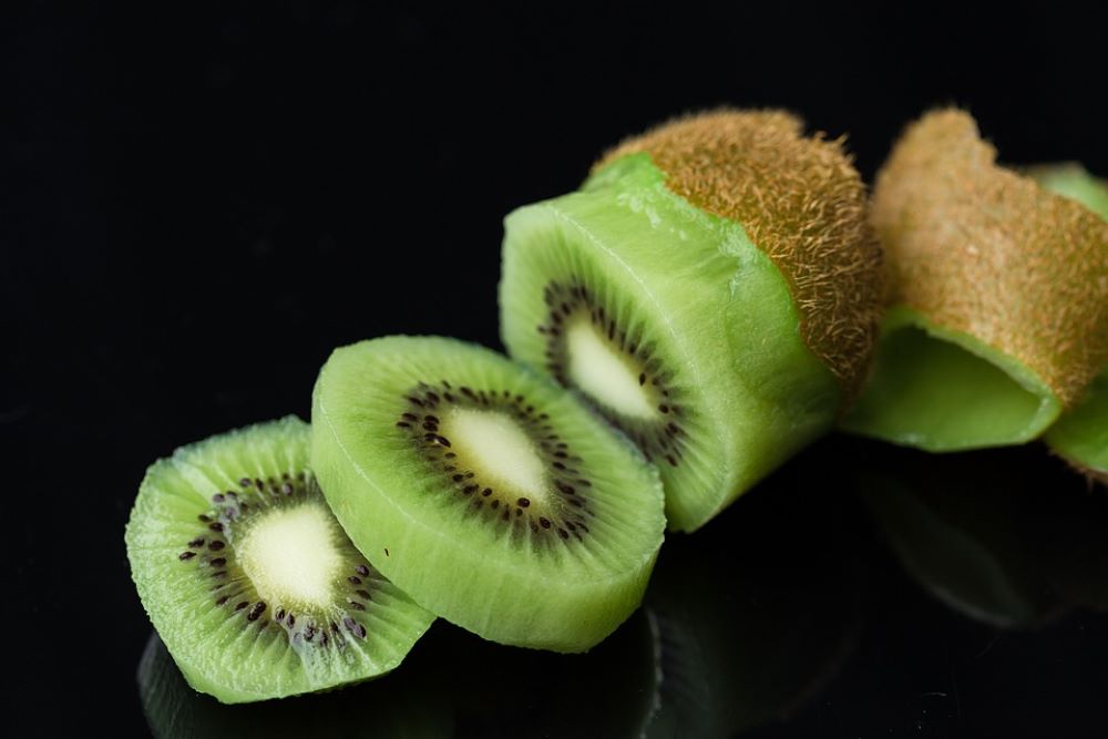 cutting a kiwi 
