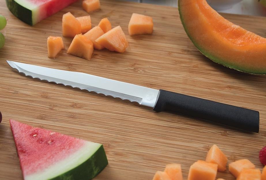 Serrated knife cutting melons 