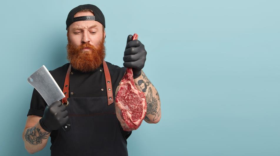 Chef holding a cleaver 