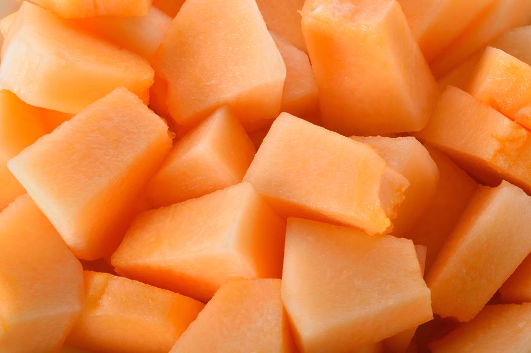 Cutting a cantaloupe into chunksblocks