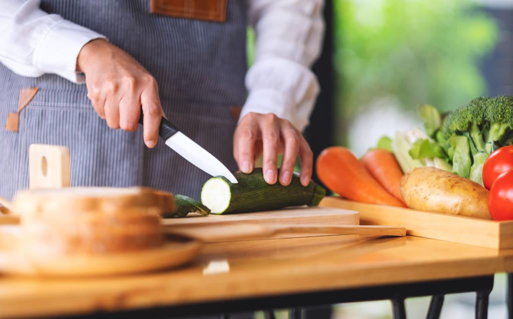 Knife cutting veggies 