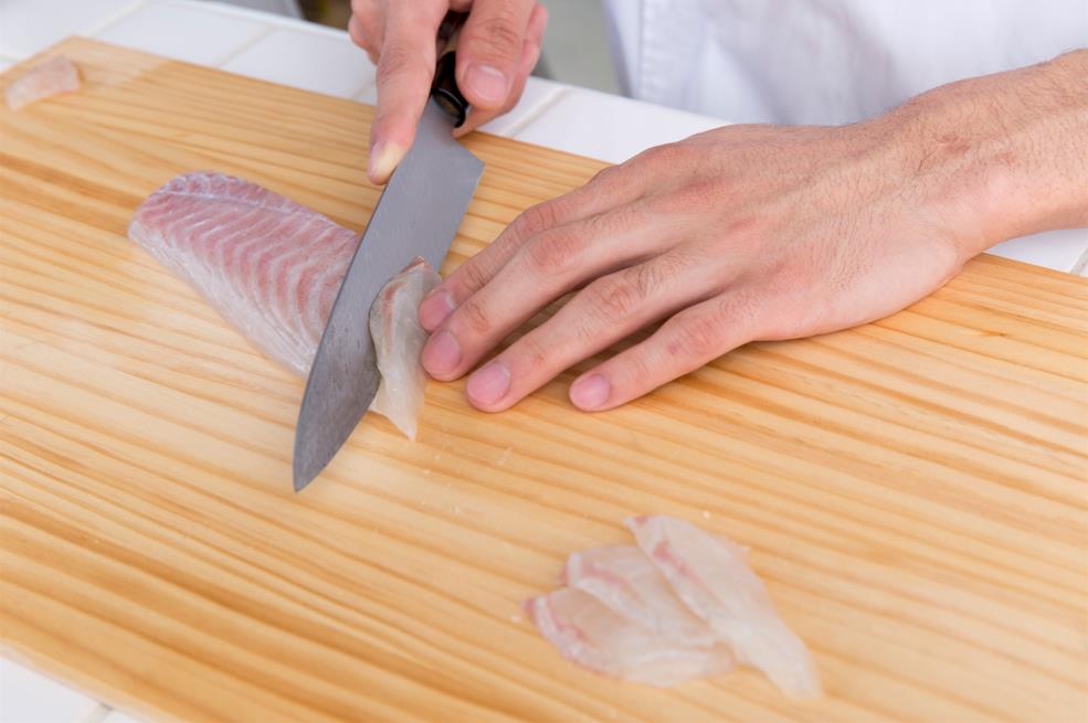 Slicing fish 