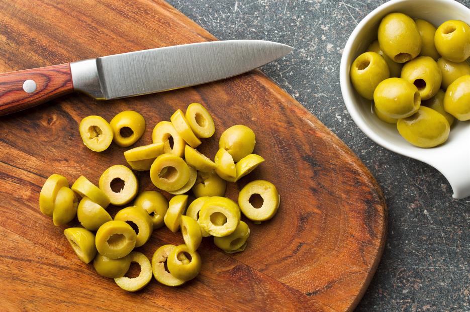 Slicing knife and olives