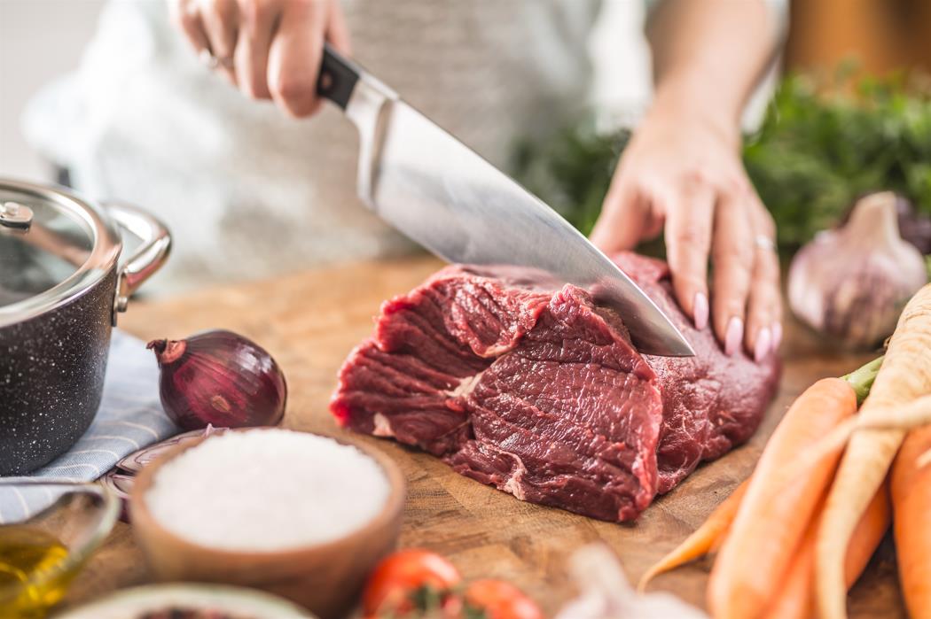 Slicing raw meat