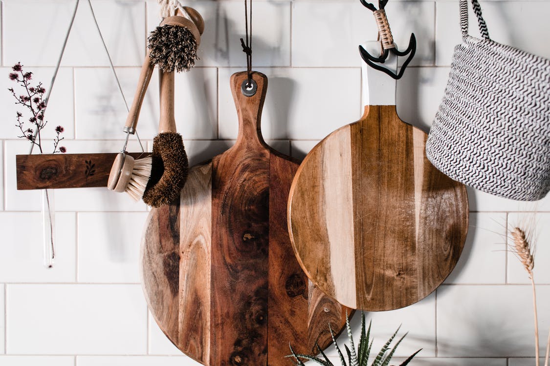 Wooden Cutting Boards on Wall Image