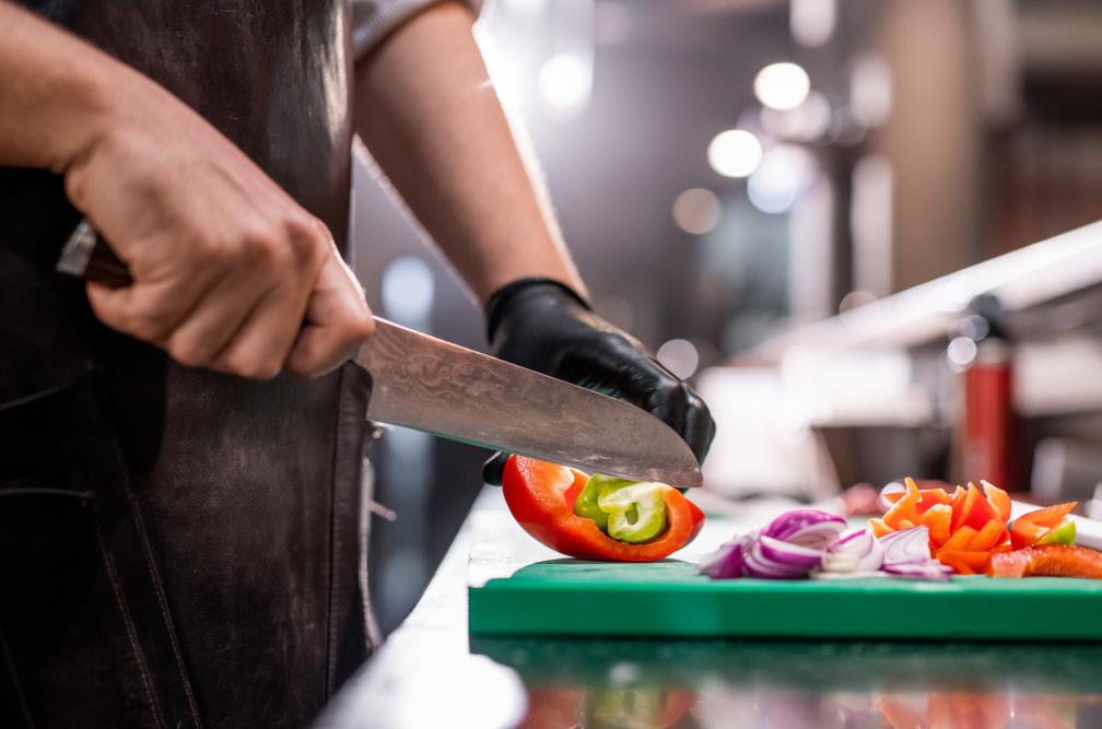 V grind knife cutting food 