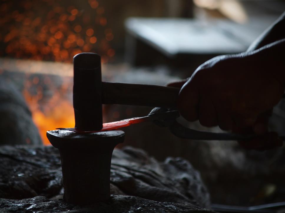 Process of making three layered steel