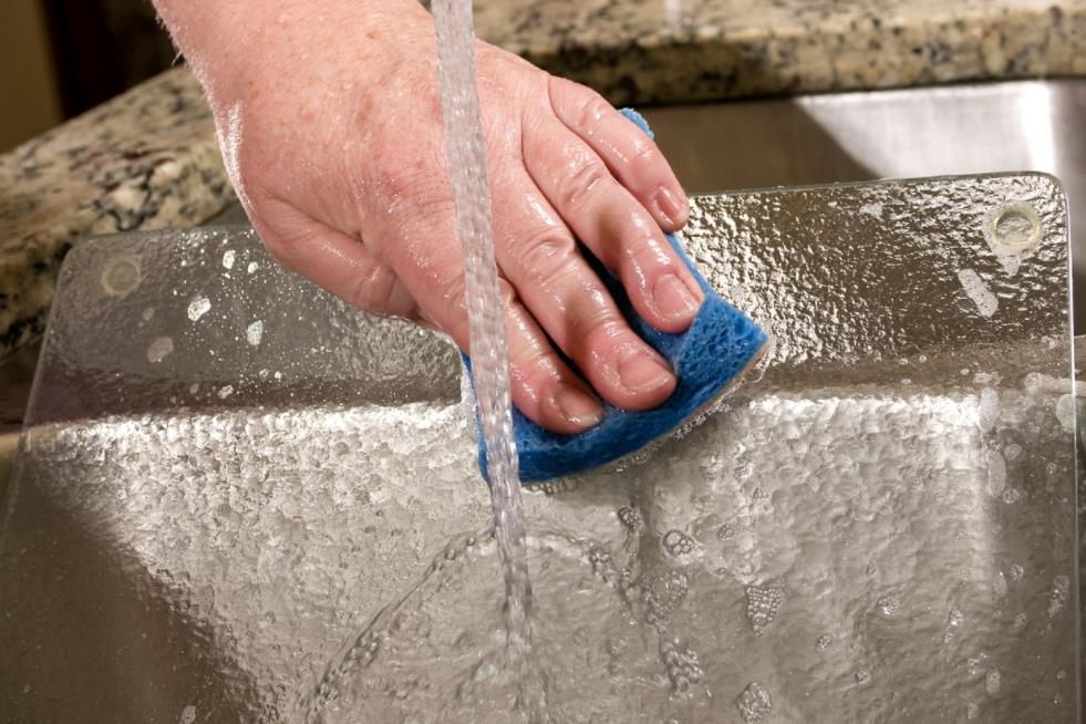 cleaning a glass cutting board