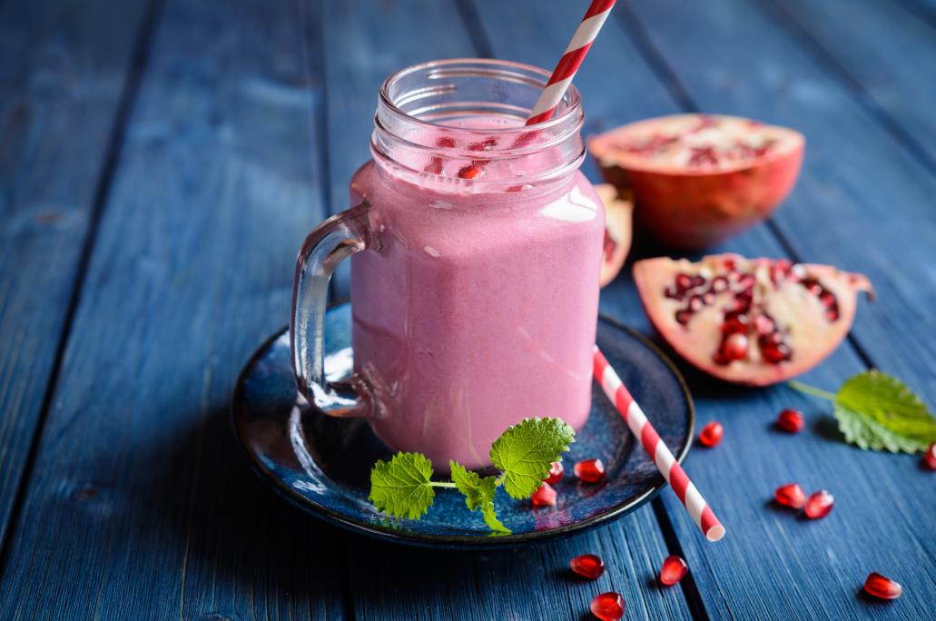 Pomegranate smoothie in a glass jar