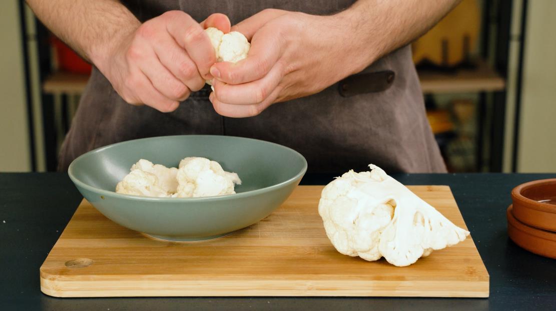 Separate the cauliflower florets