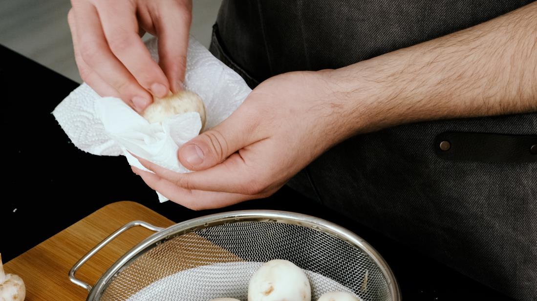 Step 1 patting mushrooms dry