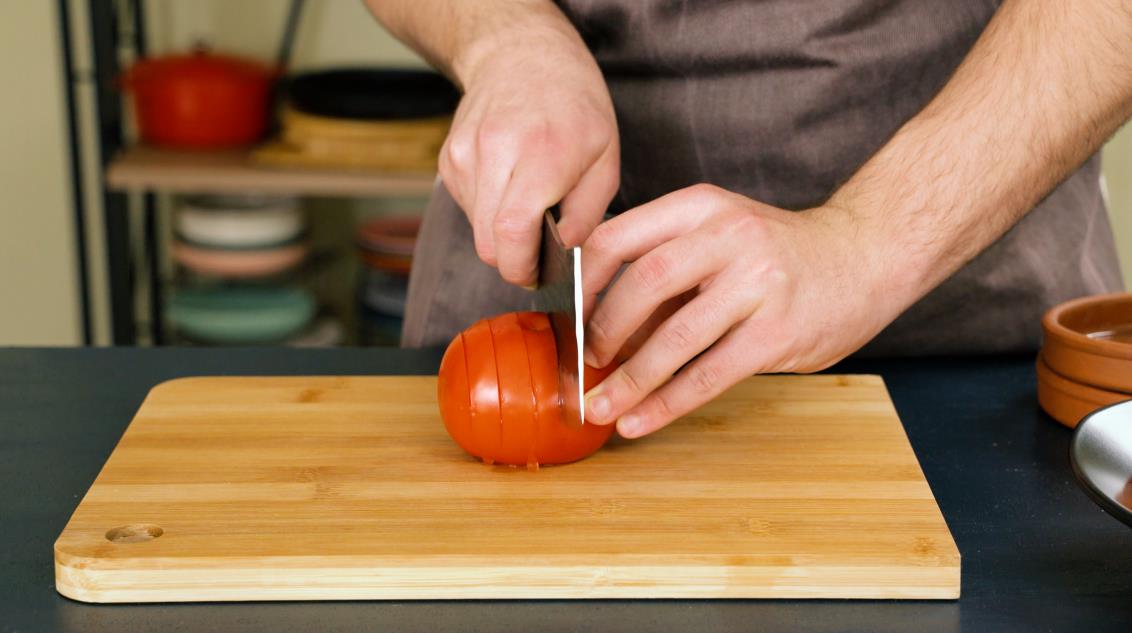 Step 2. Cut the tomato lengthwise