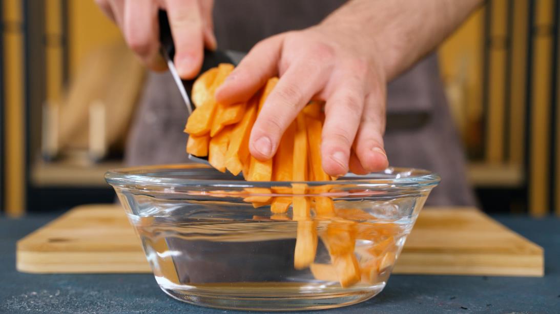 julienne cut sweet potatoes in a bowl